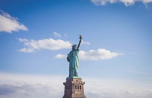new york Statue of Liberty, New York under white and blue cloudy skies art
